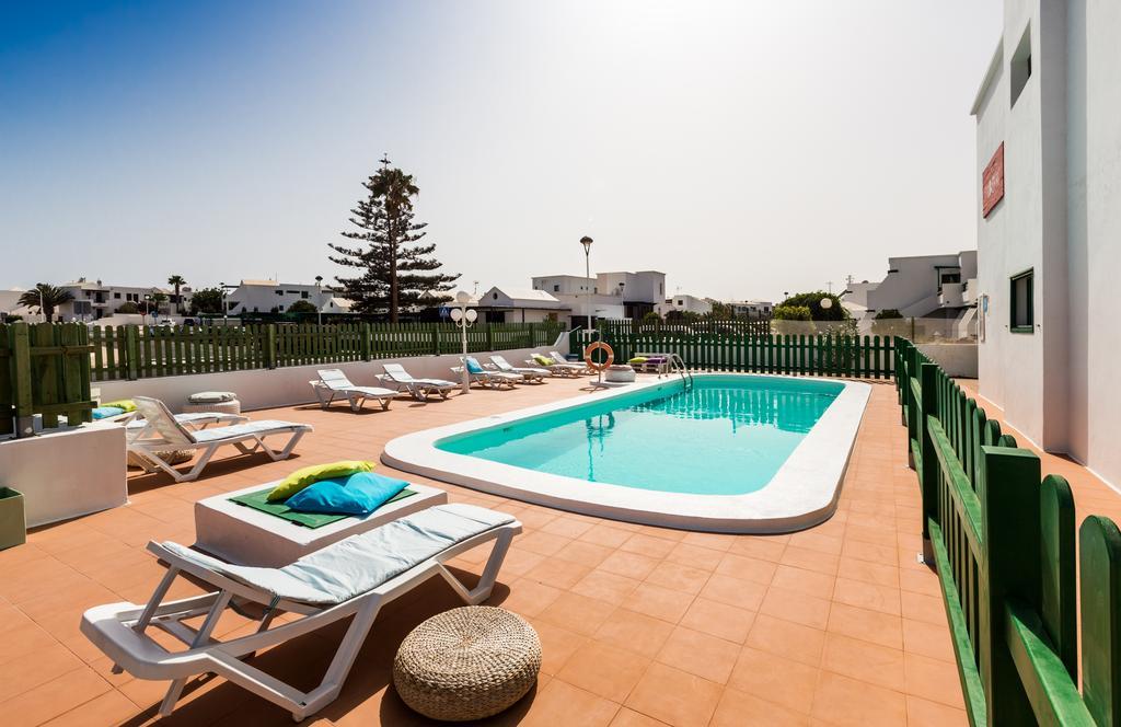 Apartamentos Flamboyant Adults Only ปูแอร์โตเดลคาร์เมน ภายนอก รูปภาพ